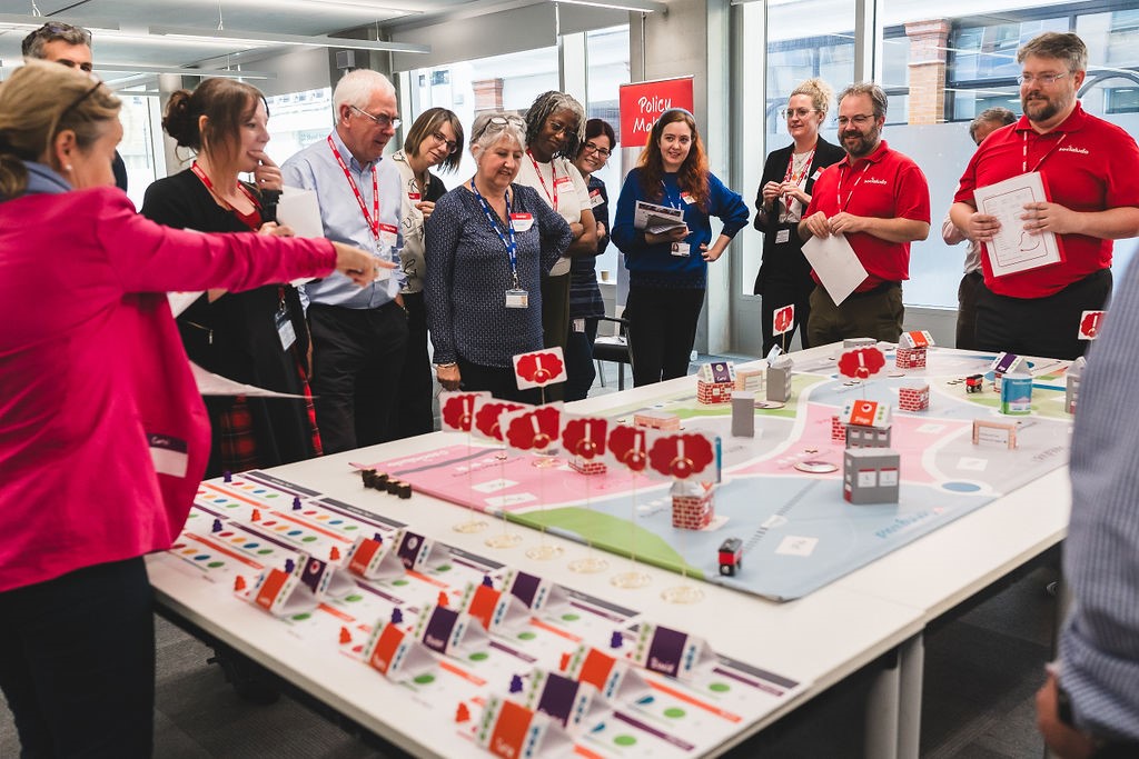 People playing the Serious Game Hopetown at the pilot study in Southwark.
