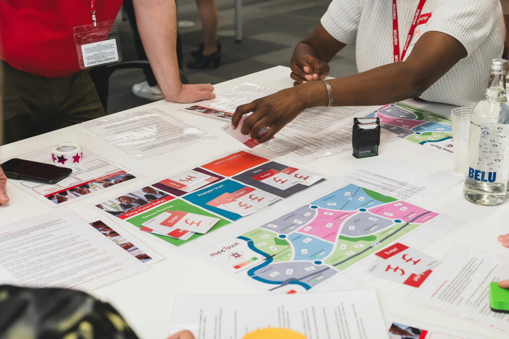 People playing the Serious Game Hopetown at the pilot study in Southwark.