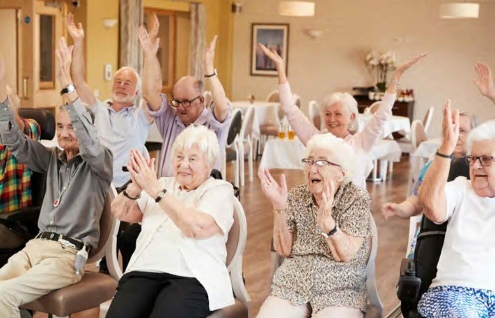 Older people clapping