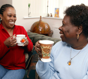 Two women having a cup of tea