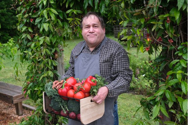 man with tomatoes