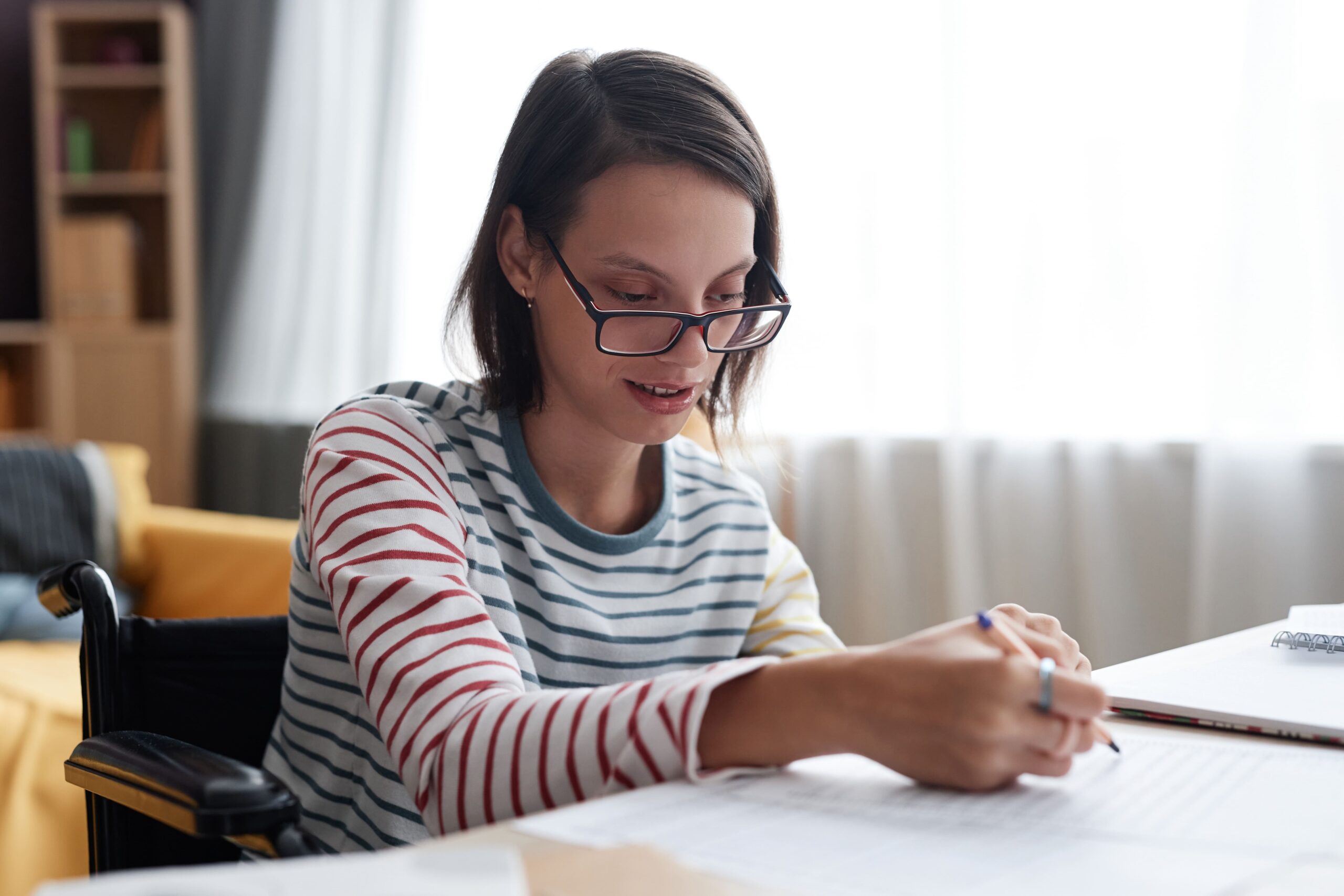 young woman writing